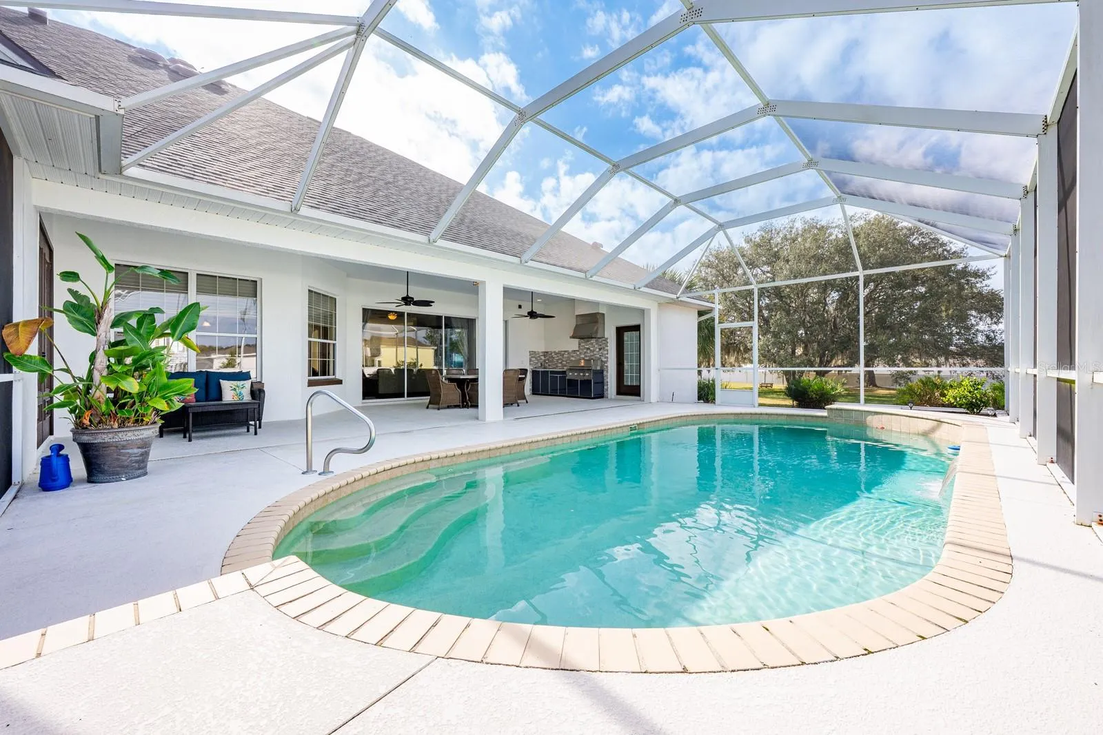 Plus an entertainer's paradise when you step outside the wall of sliding glass doors.
