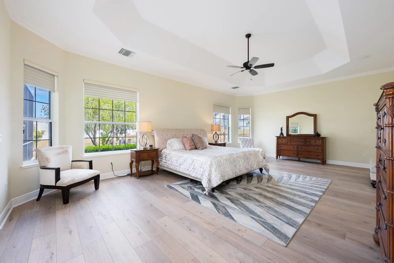 Light, bright and spacious owner's suite.