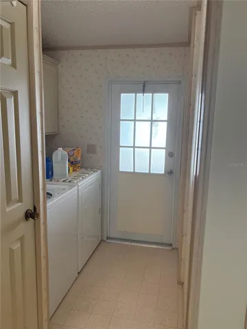 Laundry room out to carport.