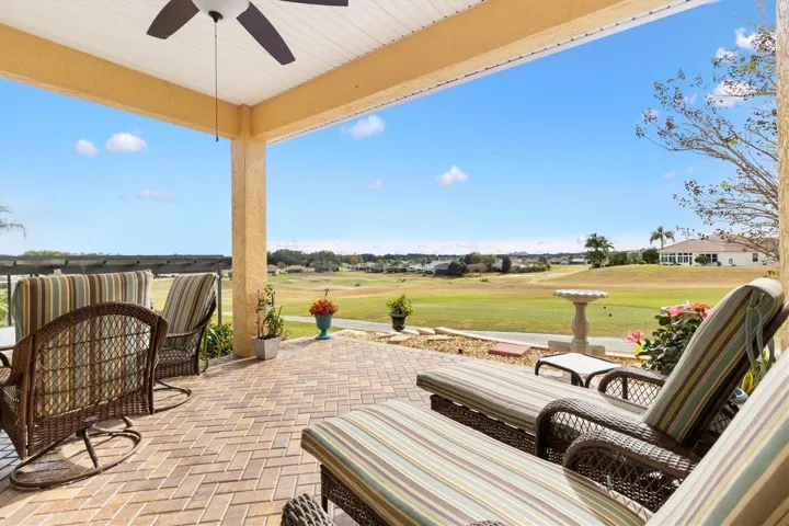 Brick paver lanai with breathtaking views of the 13th, 14, and 15th fairways.