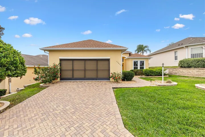 Oversized 2 car garage with sliding screen doors.