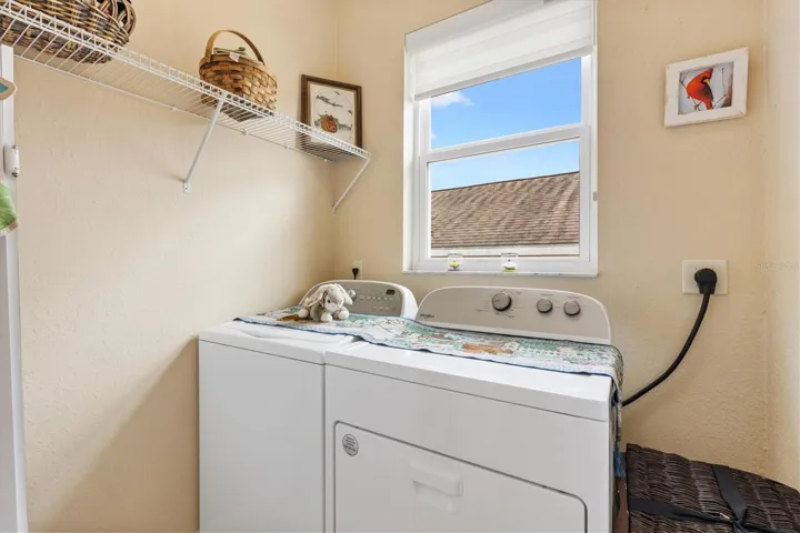 Inside laundry room off kitchen.