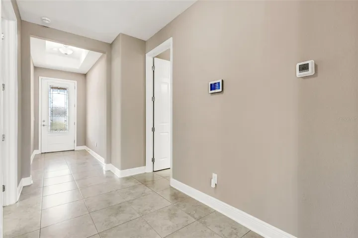 Long gallery style foyer ideal for displaying cherished artwork and photos.