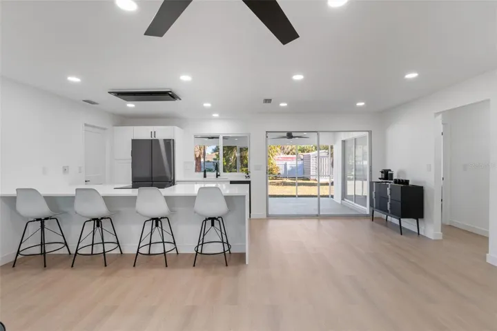 Kitchen/dining area. The door to the garage is to the left