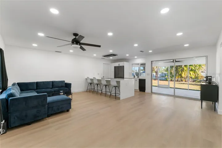 Open living room to kitchen and dining area