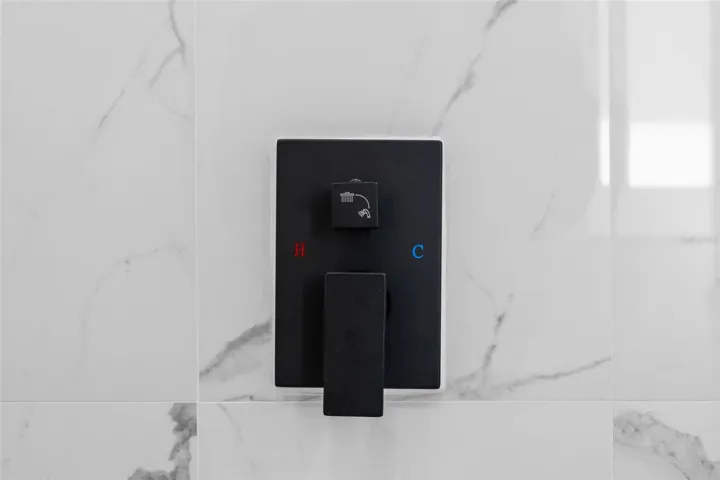 Bluetooth-connected speakers-integrated into bathroom exhaust fans in both bathrooms