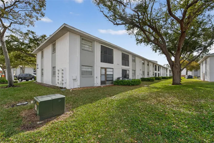 Beautifully maintained grounds and mature trees adorn your new home