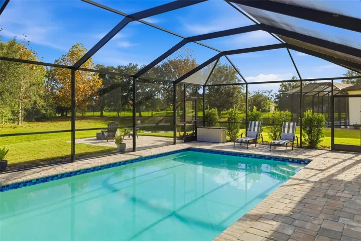 Pool added after the home - very custom and large lanai for epic pool bashes!