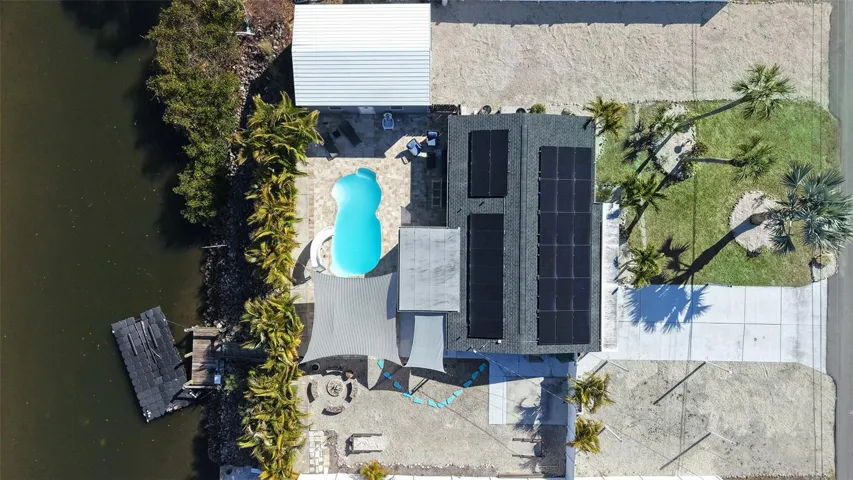 Satellite View w/Canal, Pool, Garage, Solar, Play Area