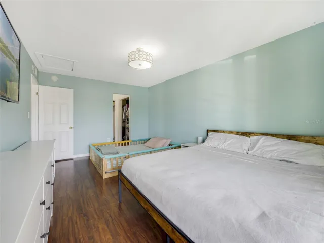 The Primary Bedroom provides a comfortable retreat with a WALK-IN CLOSET and private access to the bathroom.