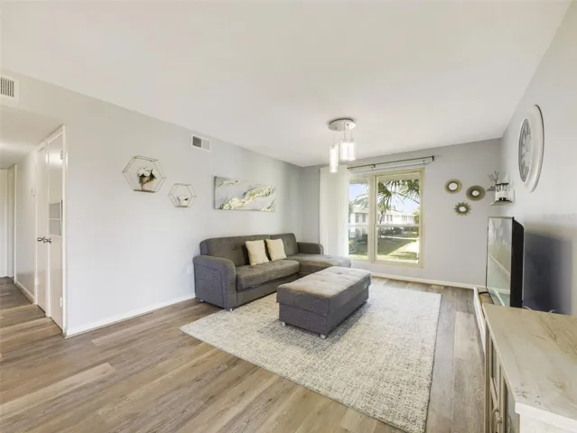 BRAND-NEW LAMINATE FLOORING (2025) adds a clean, modern look throughout the main living spaces.