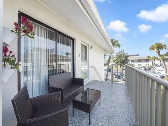 Enjoy peaceful pond views and refreshing Florida breezes from the patio.