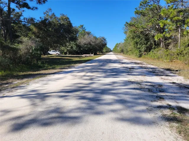 Street view from lot. Lot on the right.