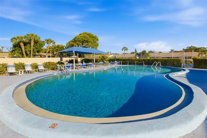 Resort-style heated pool in this Bradenton 55+ community – perfect for year-round Florida living