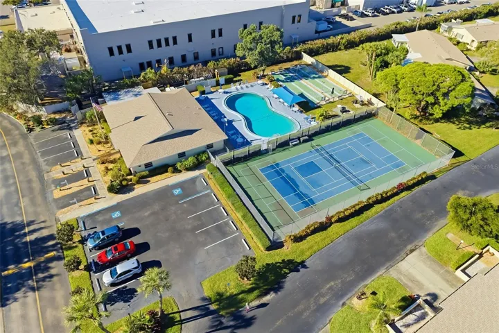 Resort-style amenities including pool, tennis courts, and shuffleboard in this active 55+ Bradenton community