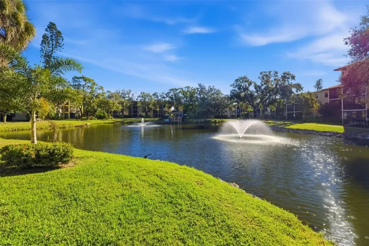 Pond View with FountainScenic pond with fountain views offering a tranquil setting within the community