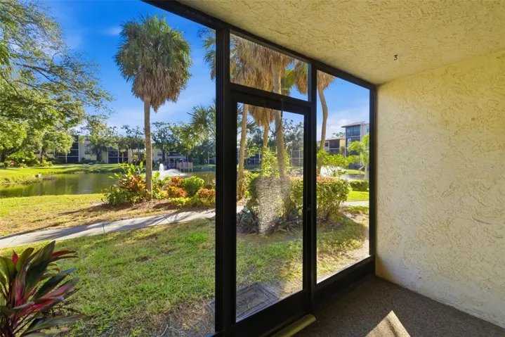 Ground floor lanai with direct access to green space and walking paths in this gated Bradenton community
