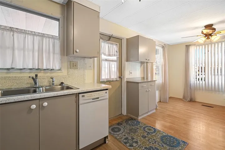 Kitchen w/ Dining room in background
