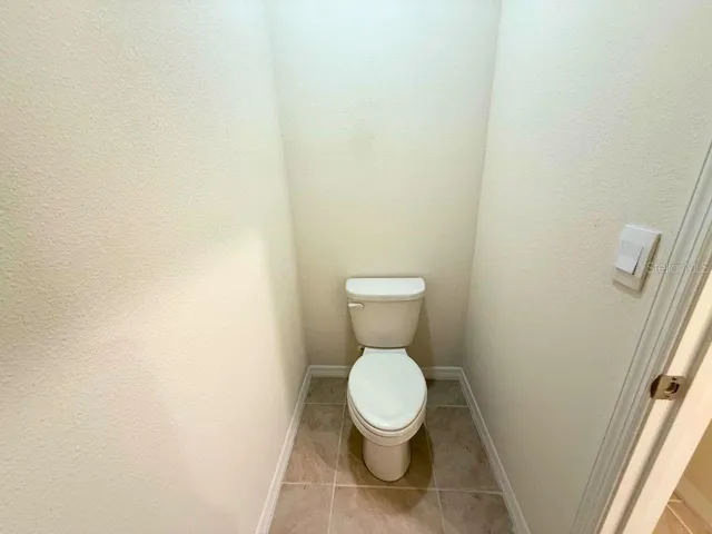 Privy Toilet Inside the Primary Bathroom