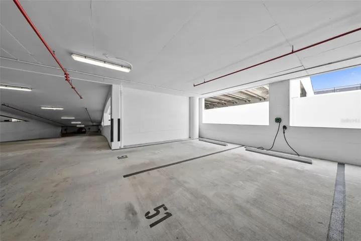 2 assigned parking spots with EV charger- 3rd floor
