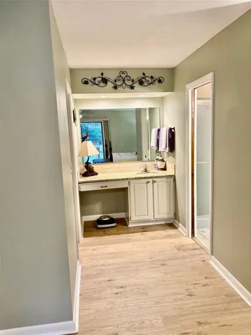 Ensuite bathroom with dressing area