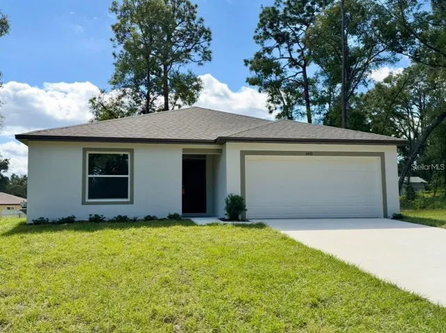 Exterior - Block Construction, landscaping & 2 car garage