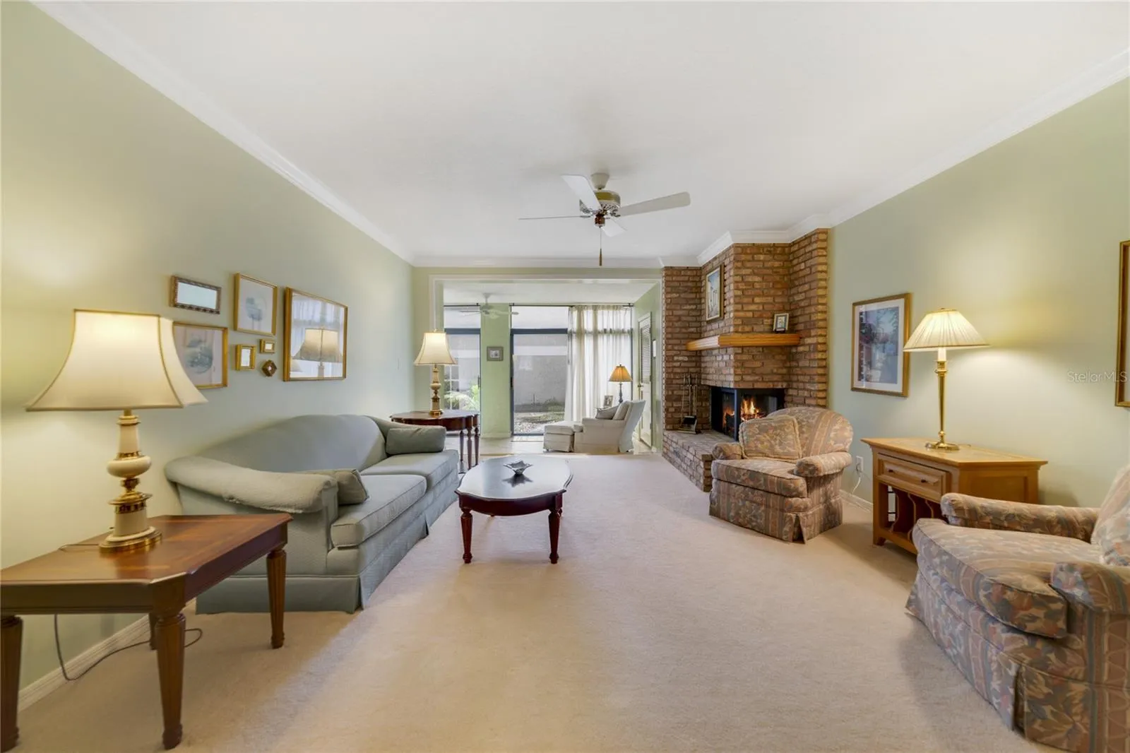 Living Room that Opens Out to Enclosed Rear Patio
