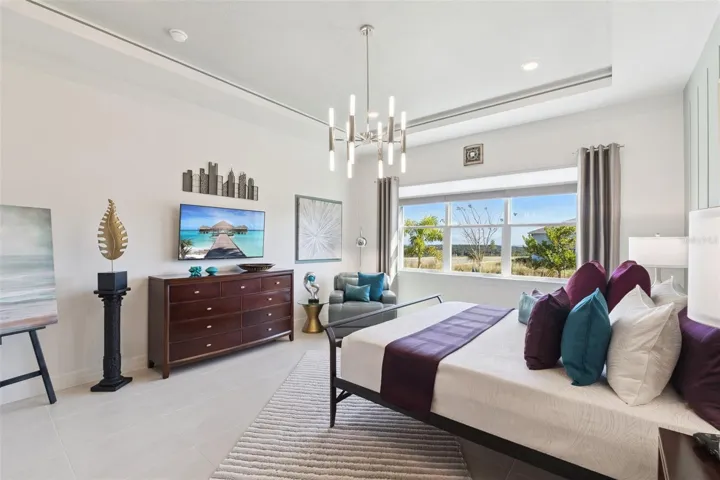 Upgrades include Tray Ceiling, Custom Paint, Chandelier, Custom Window Treatments, Accent Wall and Additional Ceiling Lights.  PLUS Owners Walk-In CLOSET #1 is over 13' Long!