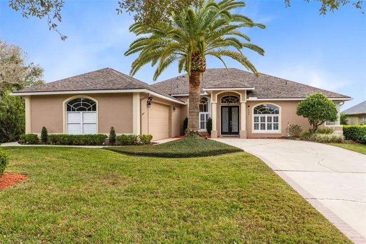 A rare oversized cul de sac lot, wide open green space views, & a floor plan designed for real Florida living set this Eastwood home apart from the moment you arrive. The property sits on approx. .28 acres, offering a larger footprint than most homes, w/ generous side yard space, added privacy, & room for a future pool.