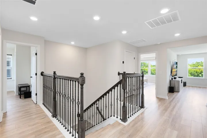 Upstairs. To the right is the Master, Bonus Room Doors. The left door is Bedroom 3.