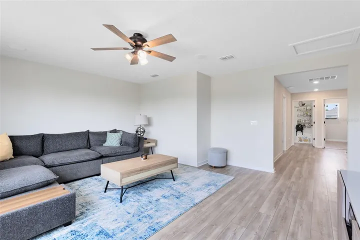 Large Bonus Room. Surround sound wiring is in place for both upstairs and downstairs zones, with built-in ceiling speakers in the loft.