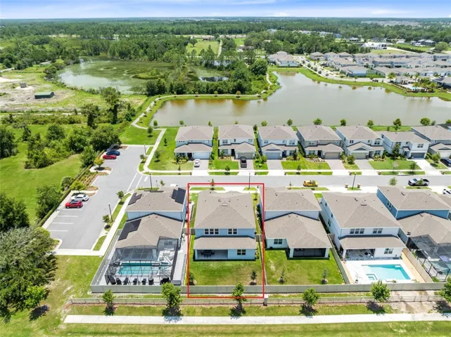 Additional features include under-stair storage with a built-in dog kennel, a laundry room with washer/dryer included, an equipment closet with utility sink, and EV charger wiring in the garage (charger does not convey; outlet will be converted to NEMA 14-15).