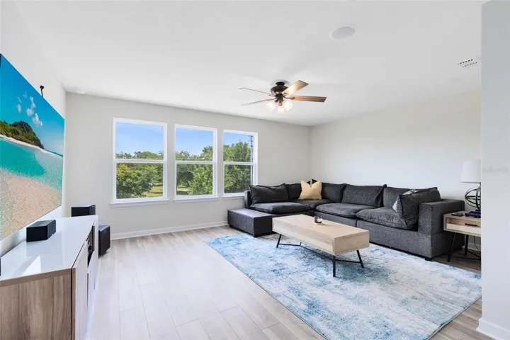 Large Bonus Room. Surround sound wiring is in place for both upstairs and downstairs zones, with built-in ceiling speakers in the loft.