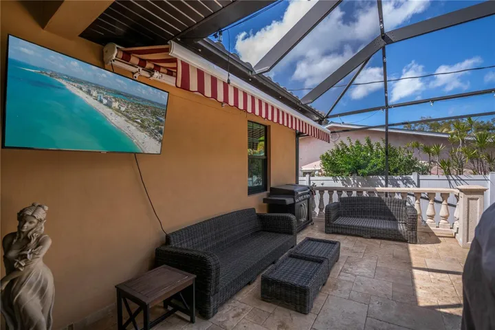 Retractable awning over sitting area