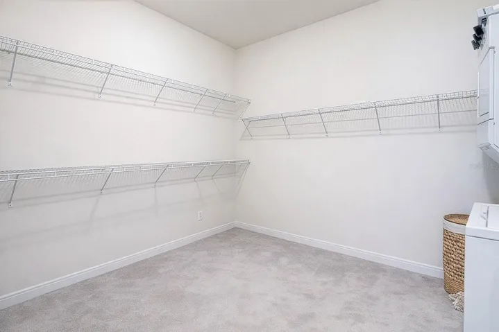 Primary Suite Closet with Laundry