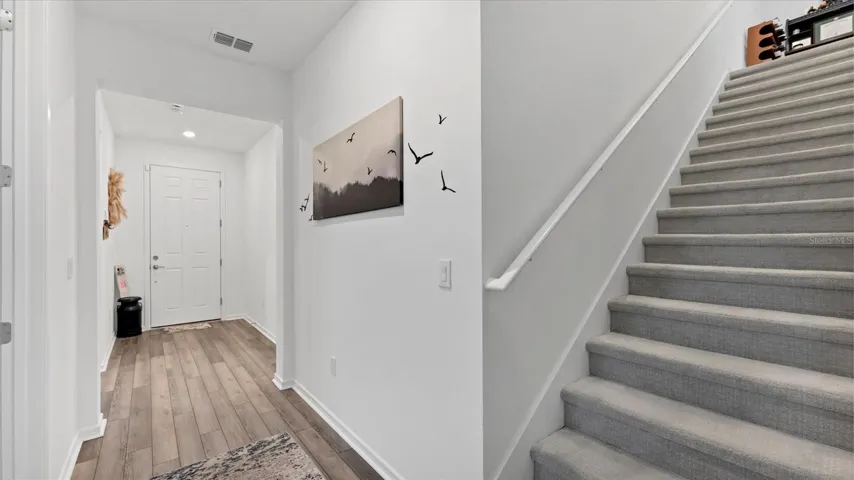 Foyer and stairs to 2nd floor