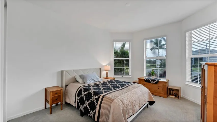 Guest bedroom with beautiful bay windows