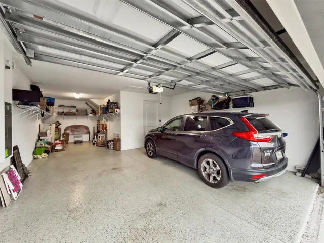 Two car garage with tandem or storage space = 3 cars or 2 cars and a golf cart