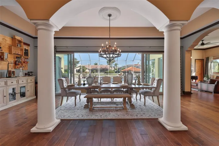 dining room with pool in back