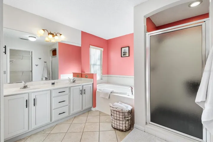 Ensuite Master Bath with Separate Tub and Large Shower