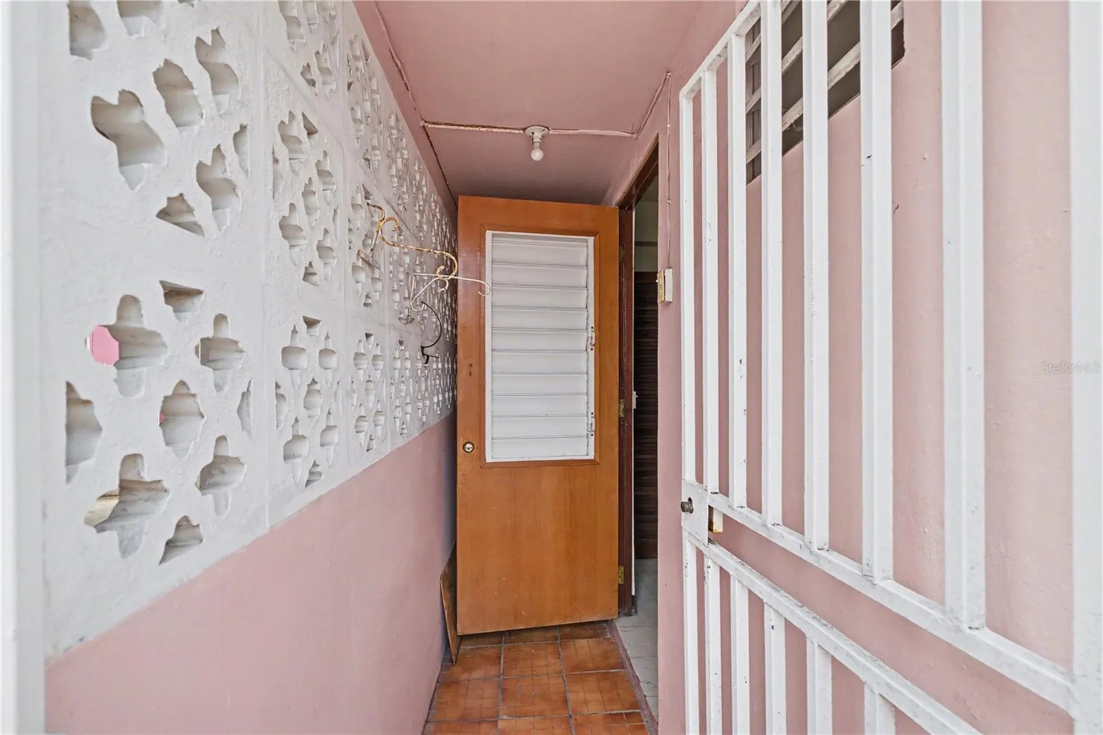 Former service quarters with private entry and value-add potential.
