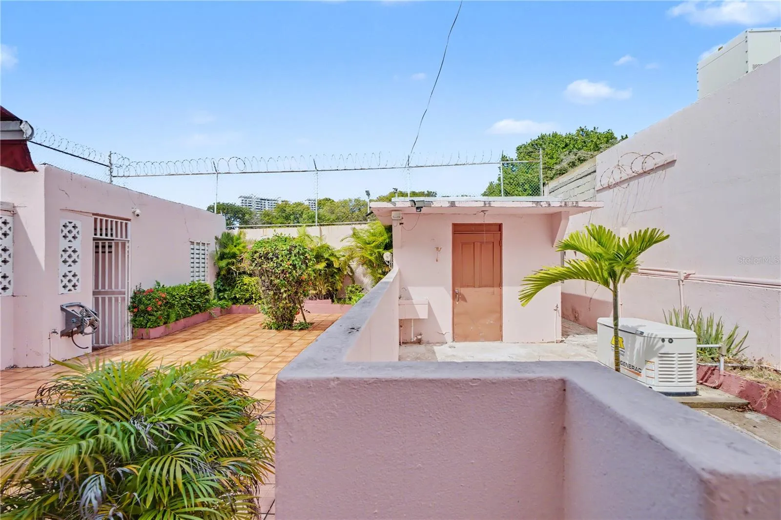 Rear patios and terraces with service rooms and generator