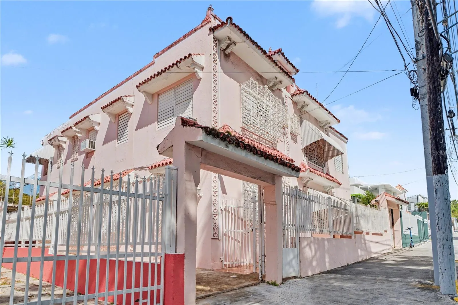 Corner facade historic district Mediterranean-style property