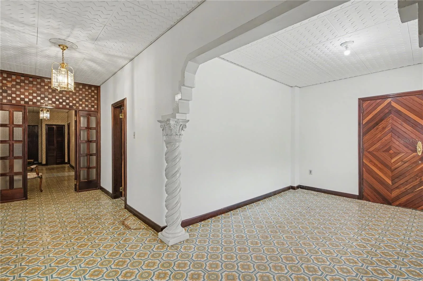 Open interior space highlighting historic architectural details and flexible layout.