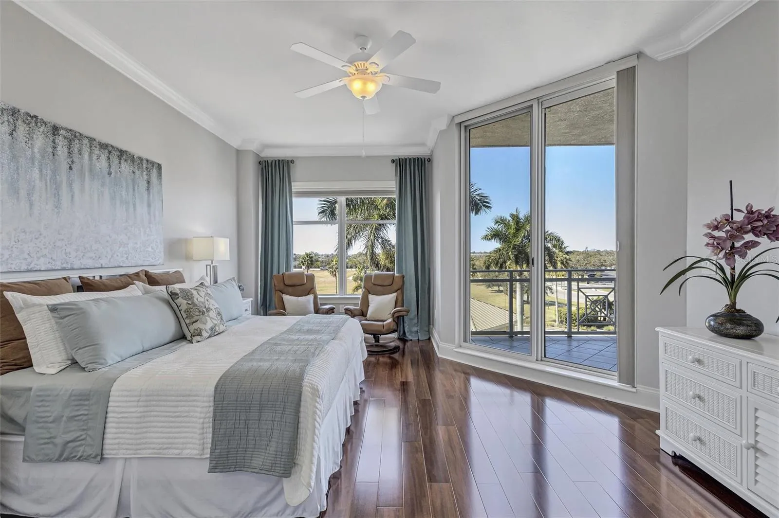 Primary Suite with Dual Walk in Closets, Ensuite Bath and Balcony Access