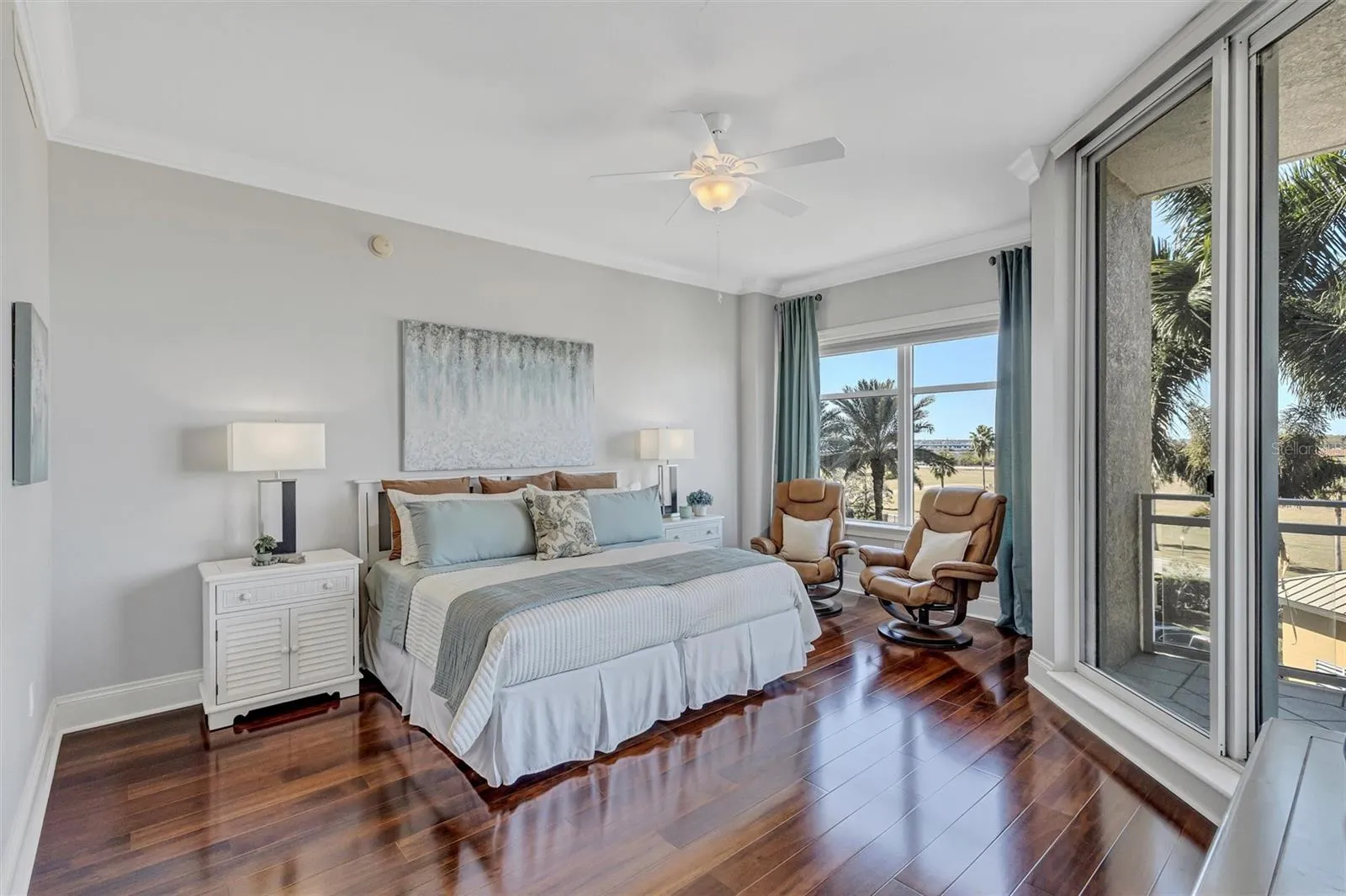 Primary Suite with Dual Walk in Closets, Ensuite Bath and Balcony Access