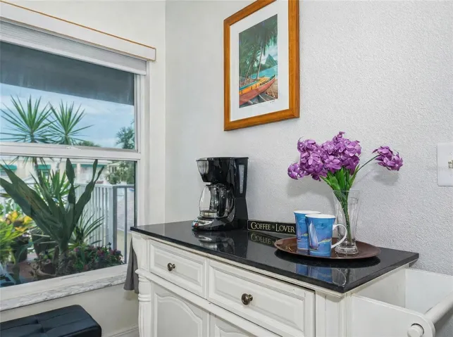 Morning coffee comes with waterfront sunrises and protected preserve views.