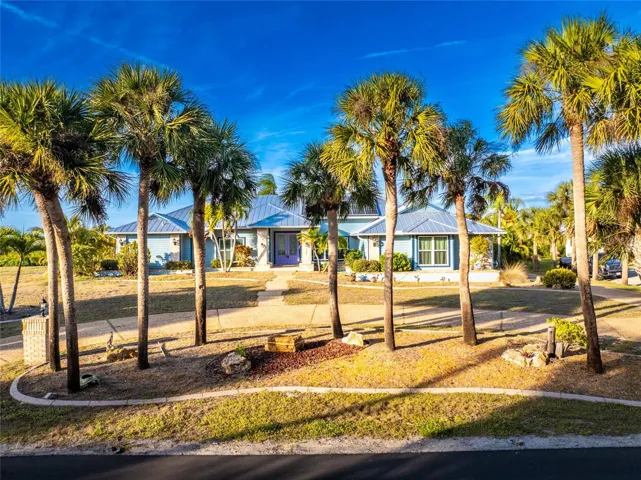 NO BRIDGES TO THE BAY from this 4 bedroom 3 bath oversized two car garage home!