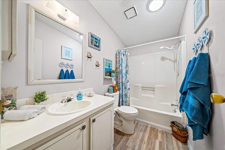 Guest Bathroom Features Shower and Tub