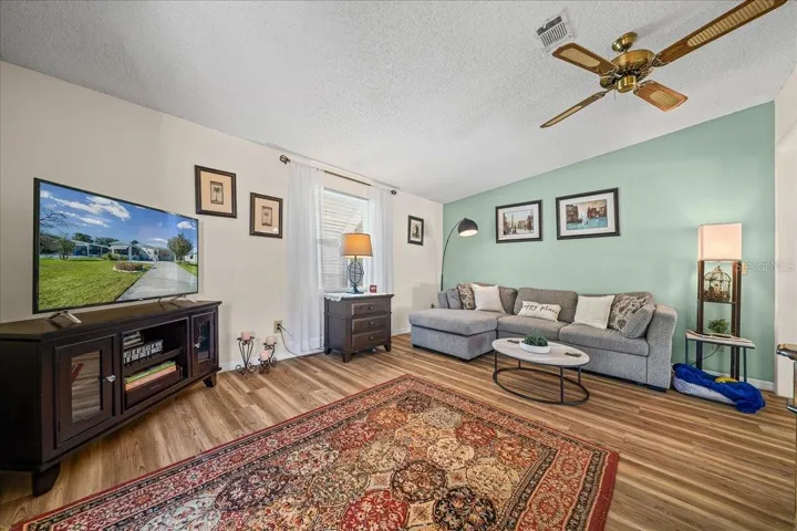 Ceiling Fan and Vaulted Ceiling in Living Room